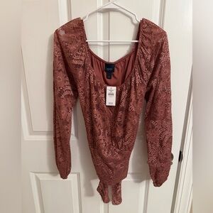 NWT women’s medium rose colored long sleeve lace blouse with tie back